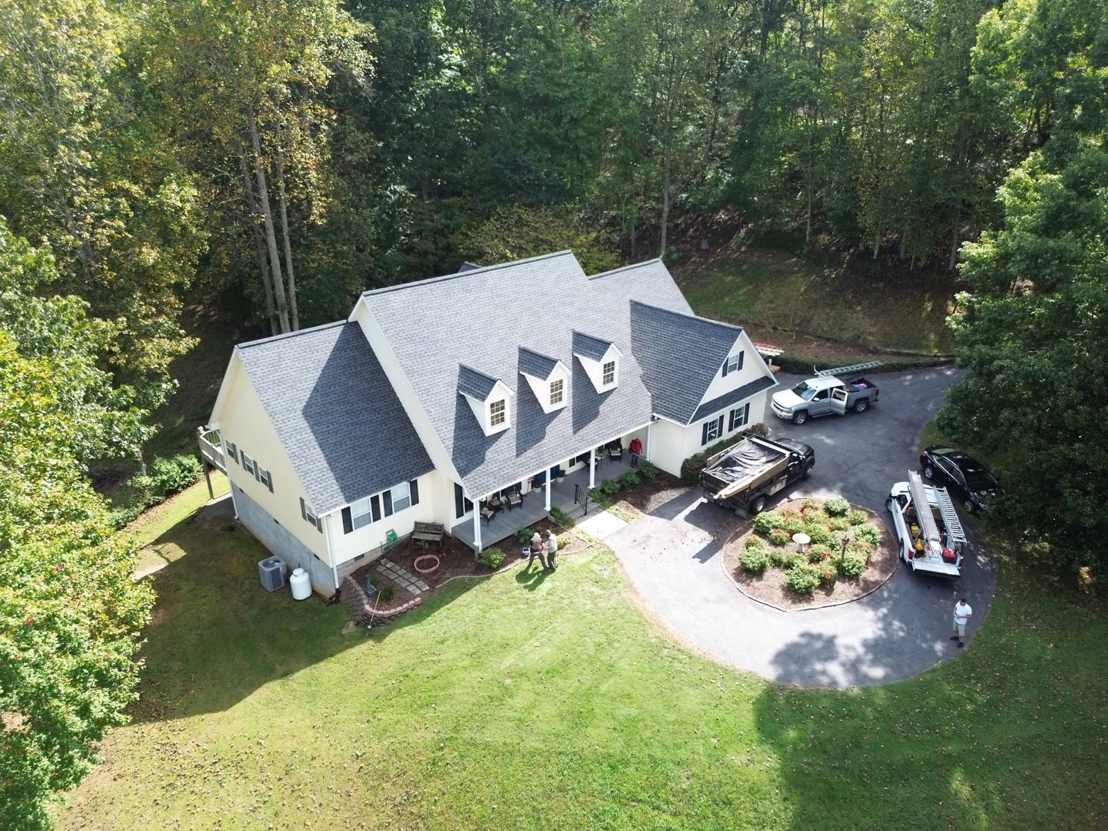Roofing crew on a residential job site